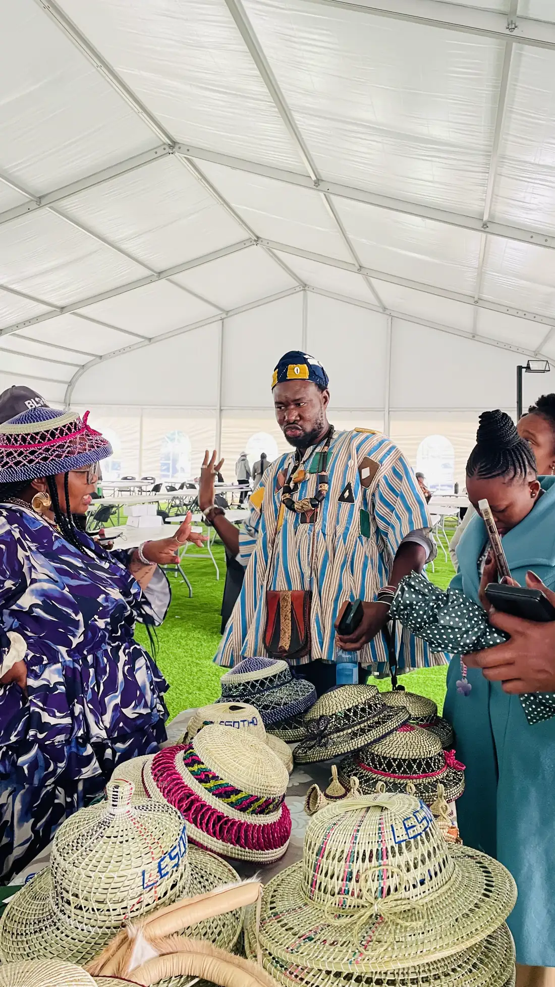 A delegate addressing exhibitors and makers at the Lesotho edition