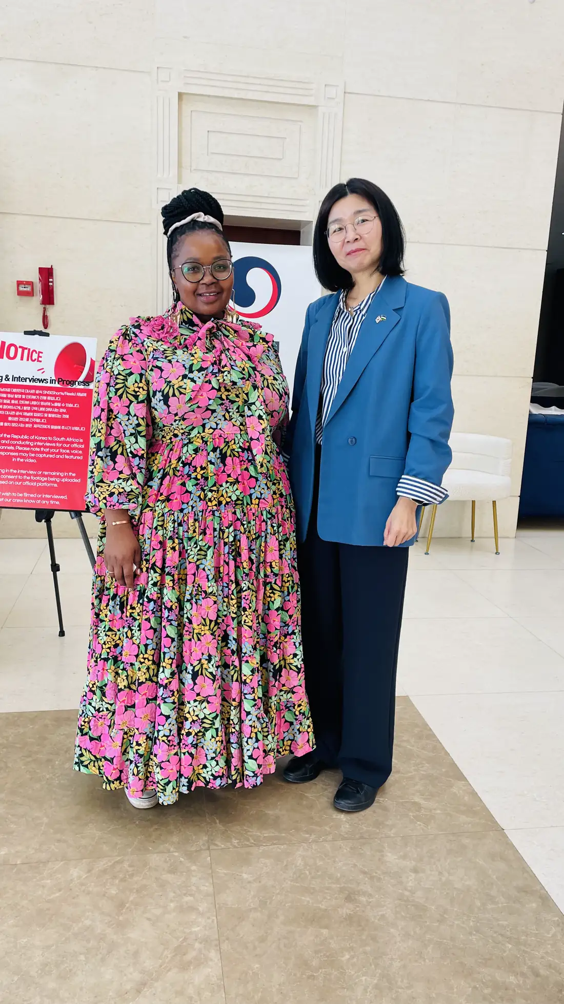 Two delegates meeting on the opening day of the Lesotho edition
