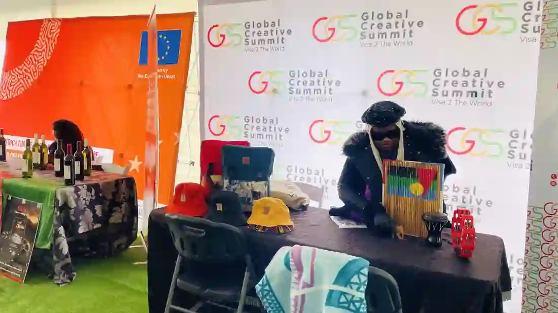 Exhibition stand showing the European Union flag alongside Global Creative Summit branding